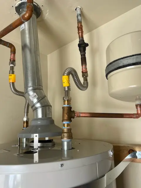 Water heater installation and plumbing repair in McLendon-Chisholm
